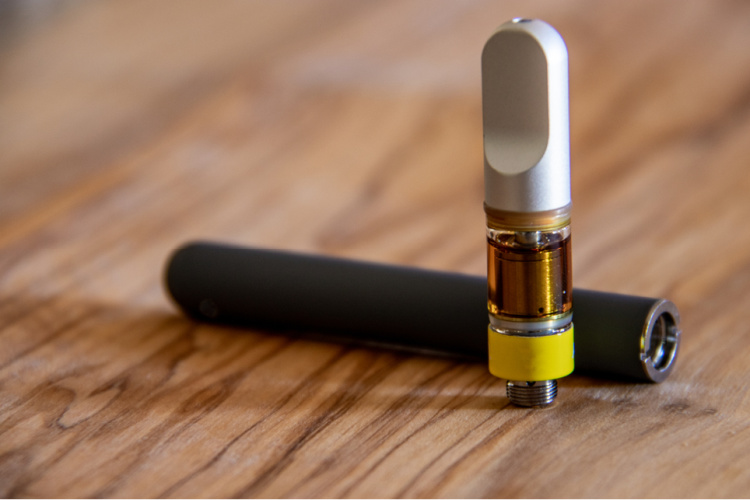 Cannabis Vaping Oil in cartridge on table