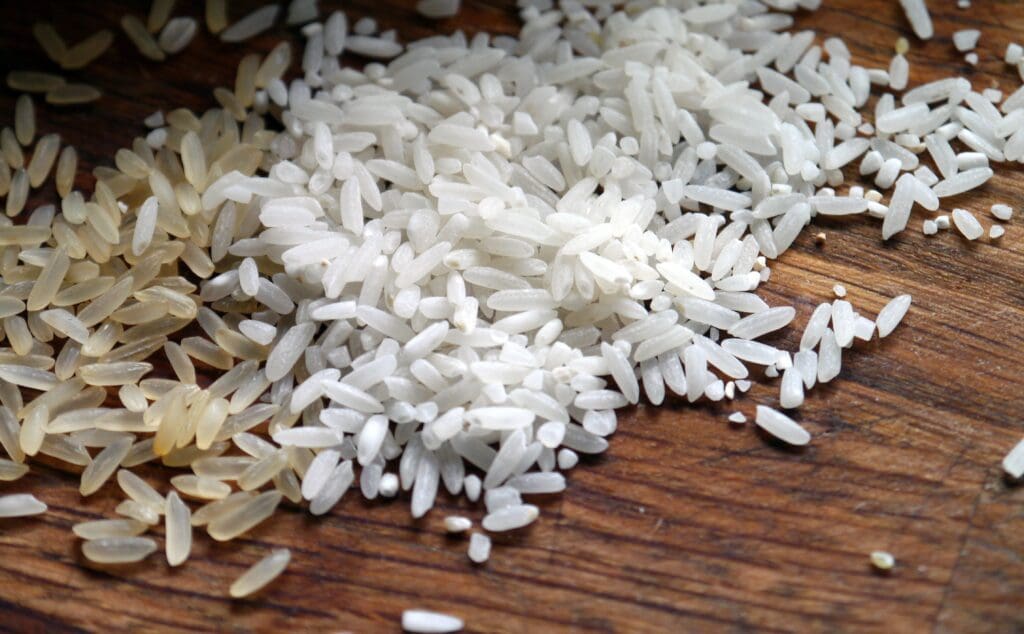 Grains of Rice on a Wood Surface